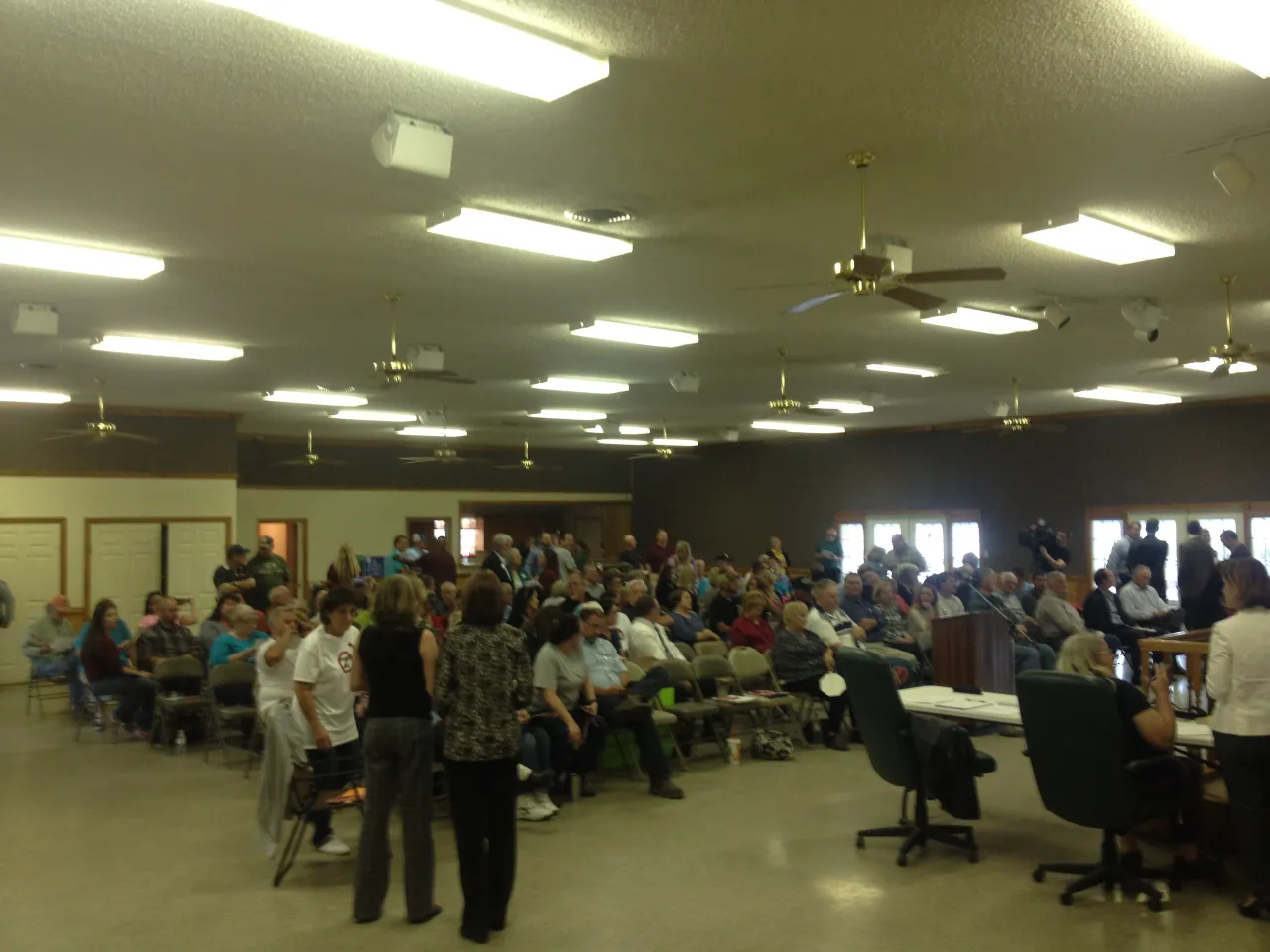 A packed community meeting in the district